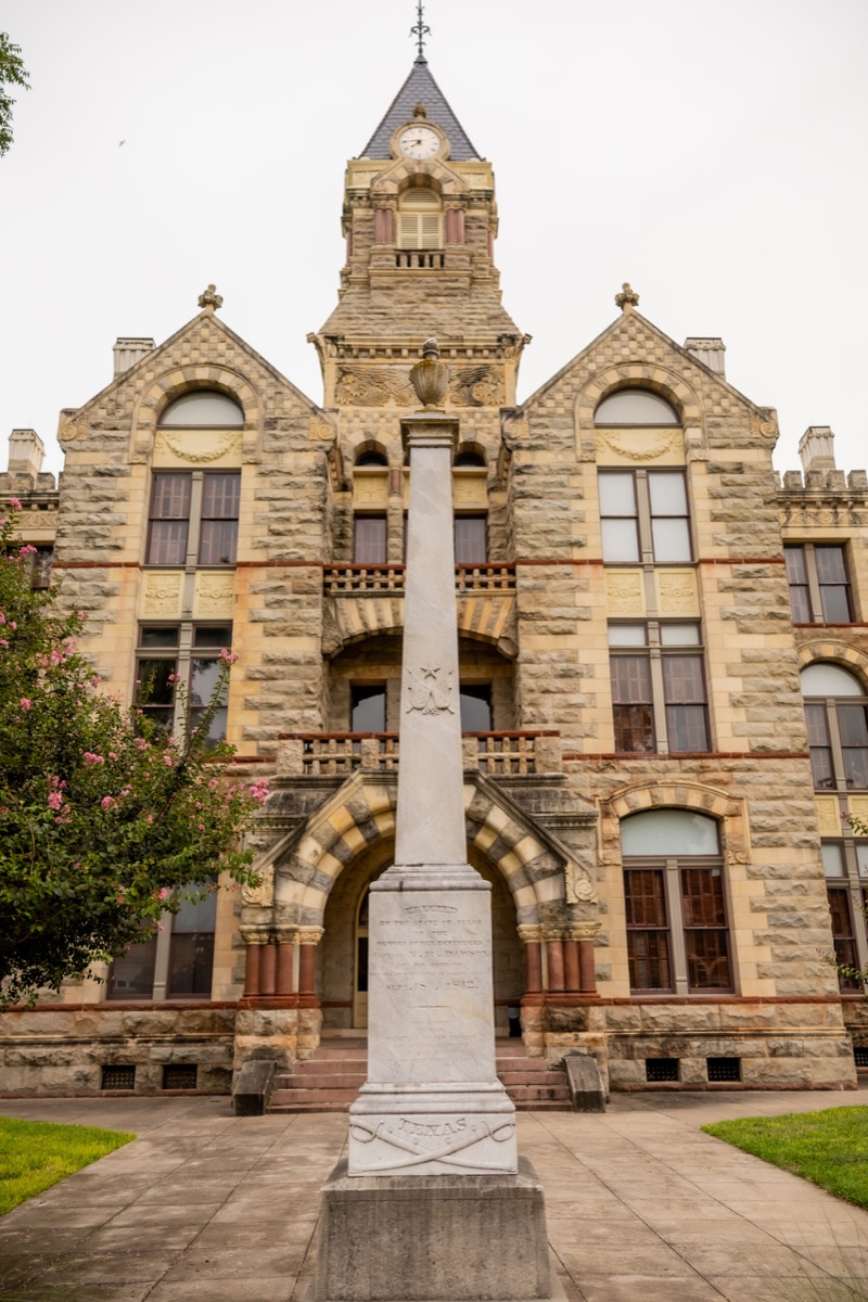 The Fayette County courthouse with the 1842 Dawson monument obelisk in front